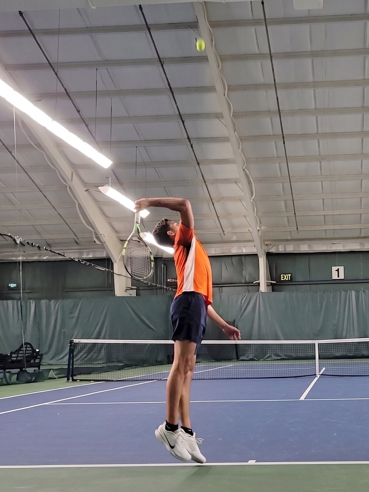 Satnam Dhanoa playing tennis